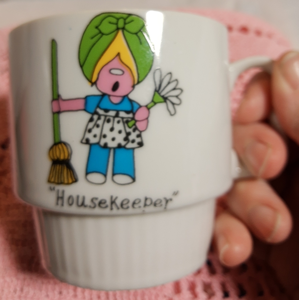 Vintage coffee or tea mug with comical housewife